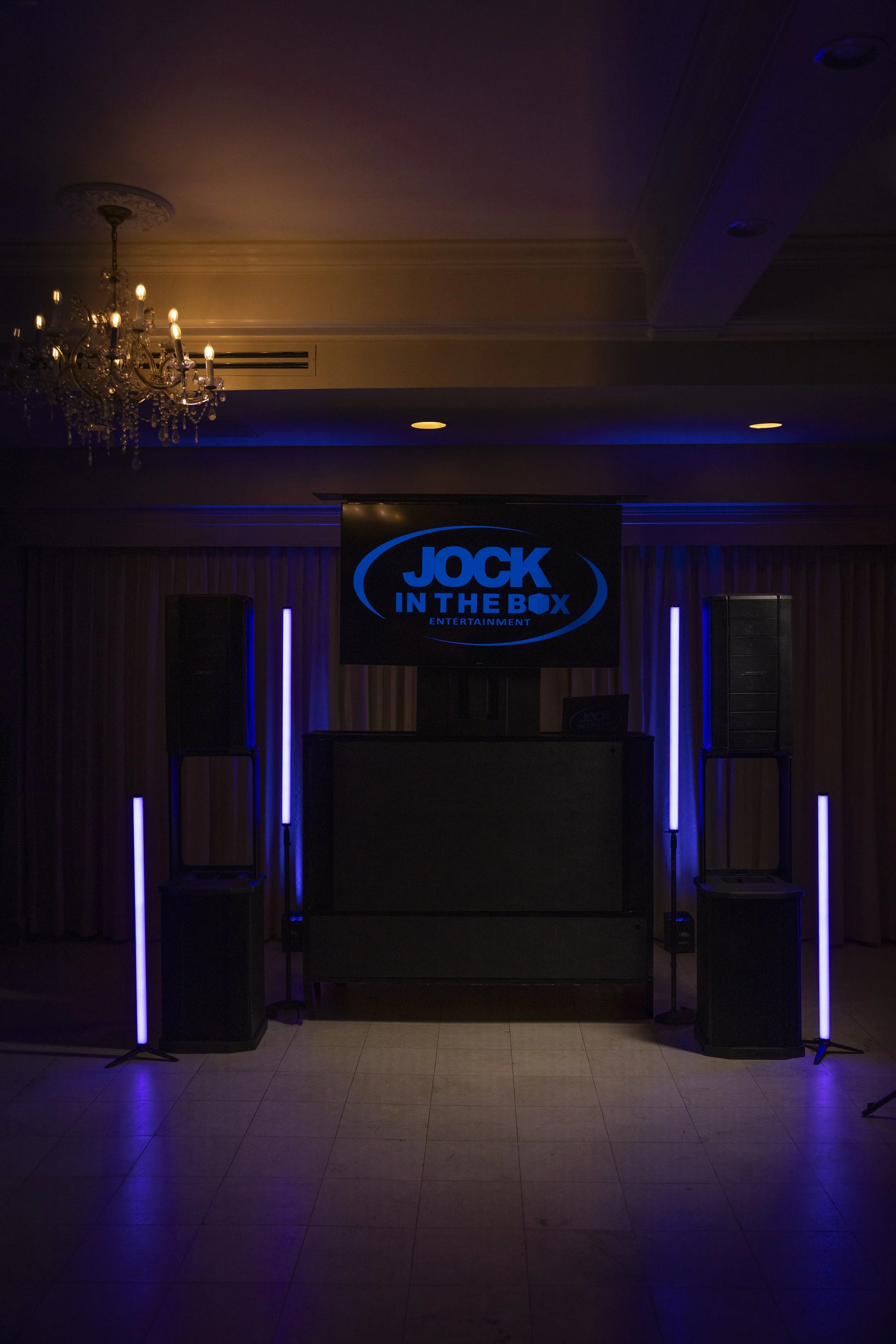 Wide view of a custom JITB DJ system at an upscale wedding venue
